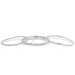 Delicate Trio Stacking Rings in white gold on a white background. 