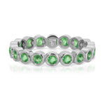 The Fern Bouquet Ring in white gold on a white background. 