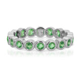 The Fern Bouquet Ring in white gold on a white background. 