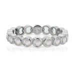 The Gardenia Bouquet Ring in white gold on a white background.