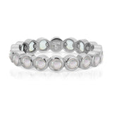 The Gardenia Bouquet Ring in white gold on a white background.