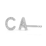 White gold pave earrings with 'C' and 'A' letters on a white background. 