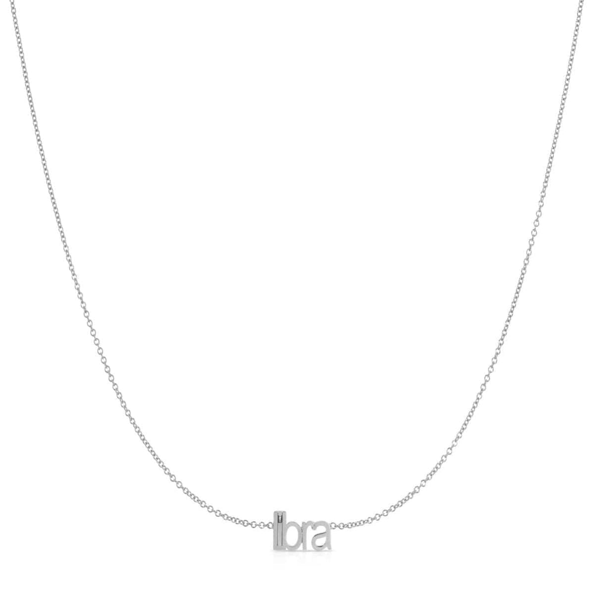 Petite Zodiac Necklace ‘libra’ in white gold on a white background.