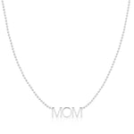 A MOM Necklace in white gold on a bead chain on a white background. 
