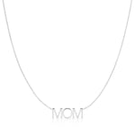 A MOM Necklace in white gold on a cable chain on a white background. 