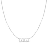 A Pavé 'GIGI' Necklace in white gold on a cable chain on a white background.