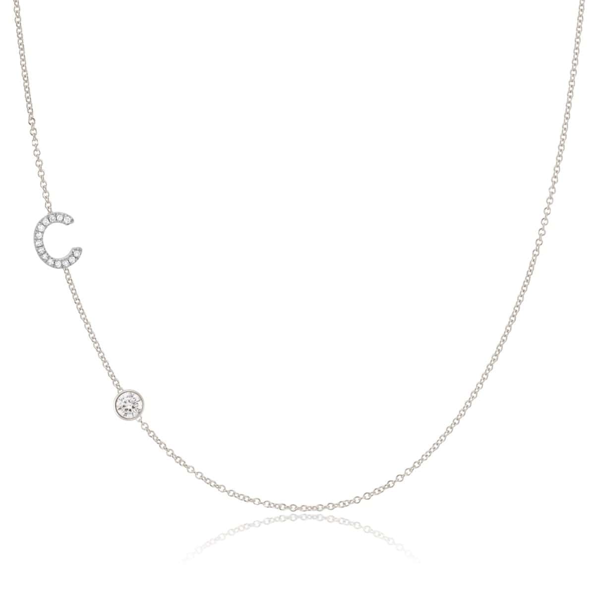 A Pavé Monogram Necklace with Diamond  and a letter C charm in white gold on a white background.