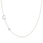 A Pavé Monogram Necklace with Diamond  and a letter C charm in white gold on a white background.