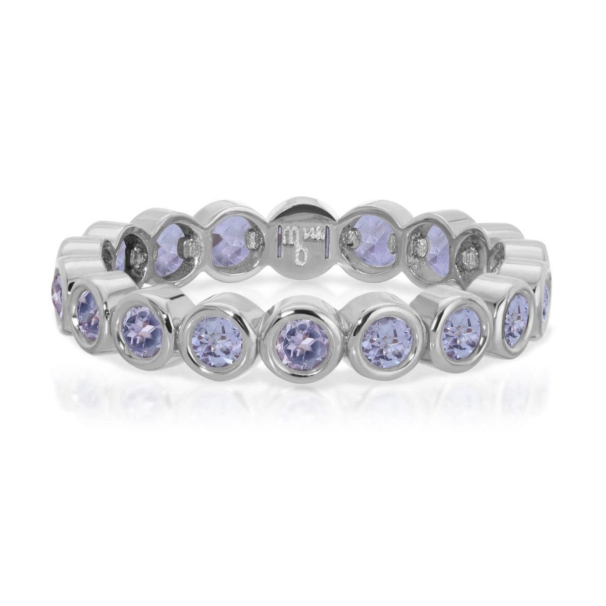 The Periwinkle Bouquet Ring in white gold on a white background.