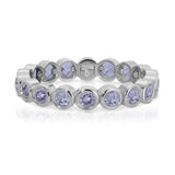 The Periwinkle Bouquet Ring in white gold on a white background.