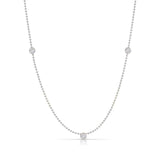 Triple Diamond Layering Necklace in white gold on a white background. 