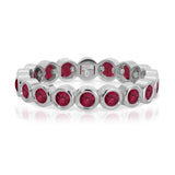 The Tulip Bouquet Ring in white gold on a white background.