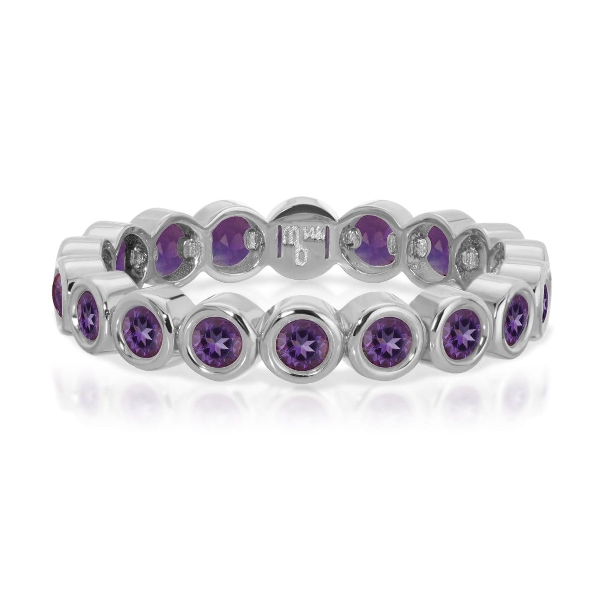 The Violet Bouquet Ring in white gold on a white background. 