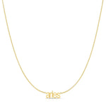 Petite Zodiac Necklace ‘aries’ in yellow gold on a white background.