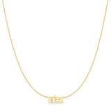 Petite Zodiac Necklace ‘aries’ in yellow gold on a white background.