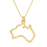 An Australia necklace in yellow gold with a diamond on a white background. 