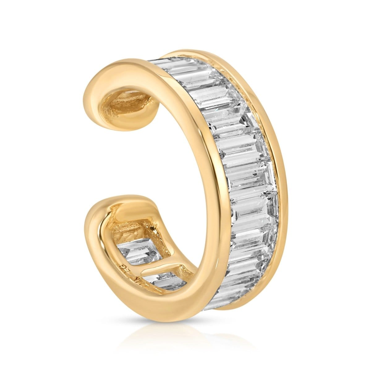 The Night Cap Ear Cuff in yellow gold on a white background. 