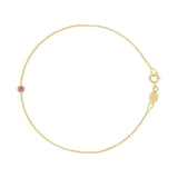 A yellow gold Birthstone Bracelet with a cable chain and pink tourmaline birthstone on a white background. 