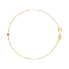 A yellow gold Birthstone Bracelet with a cable chain and pink tourmaline birthstone on a white background. 