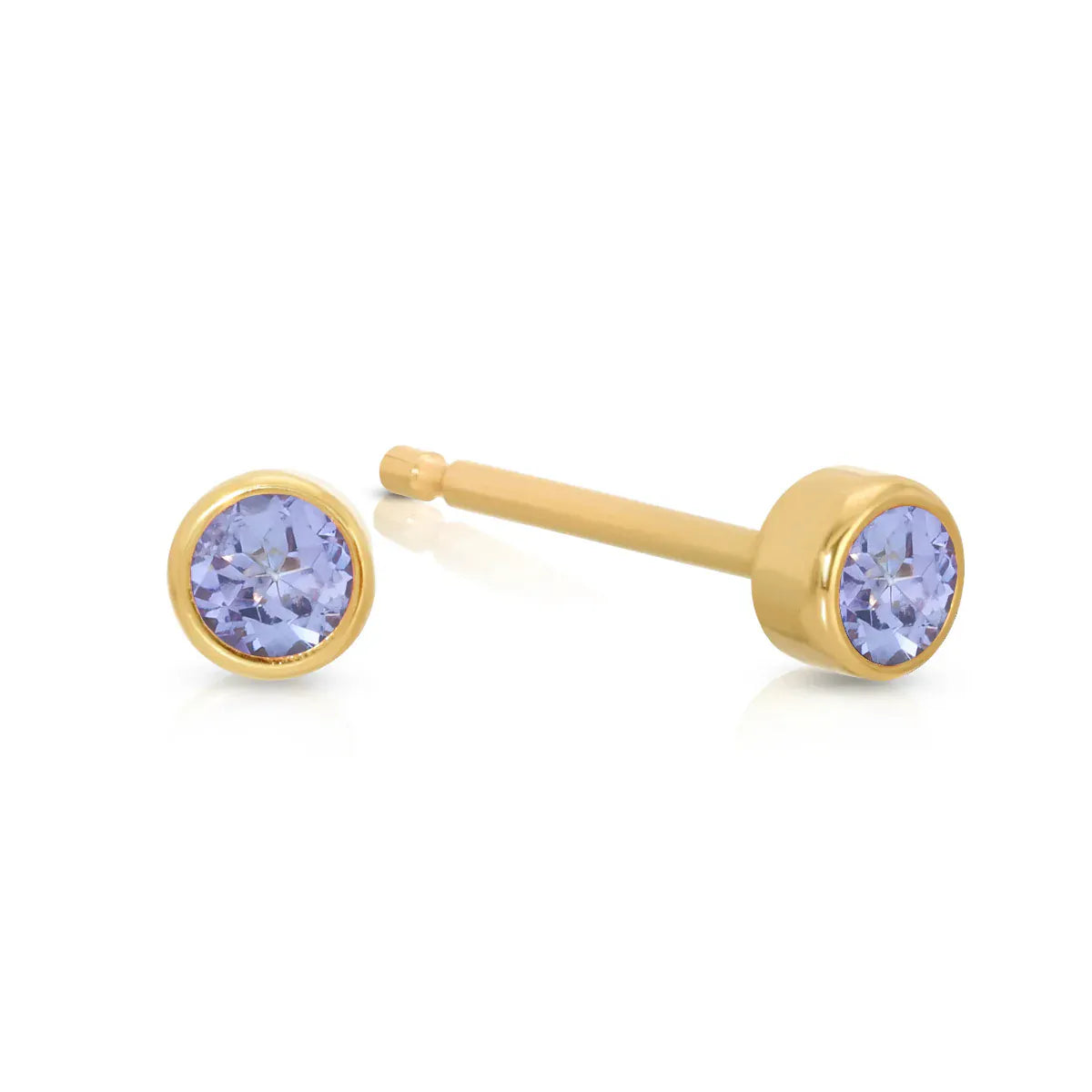 A pair of Birthstone Studs - Tanzanite (December) in yellow gold on a white background.