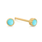 A pair of Birthstone Studs - Turquoise (December) in yellow gold on a white background.