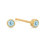A pair of Birthstone Studs - Aquamarine (March) in yellow gold on a white background.