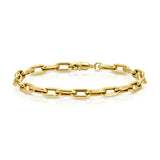 A Bold Link Bracelet in yellow gold on a white background. 