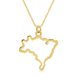 A Brazil necklace in yellow gold with a diamond on a white background. 