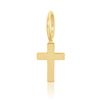 Gold cross pendant on a white background