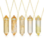 Five The Happiness Retreat Necklaces on a white background.