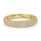 A Cosmo Ring in yellow gold on a white background. 