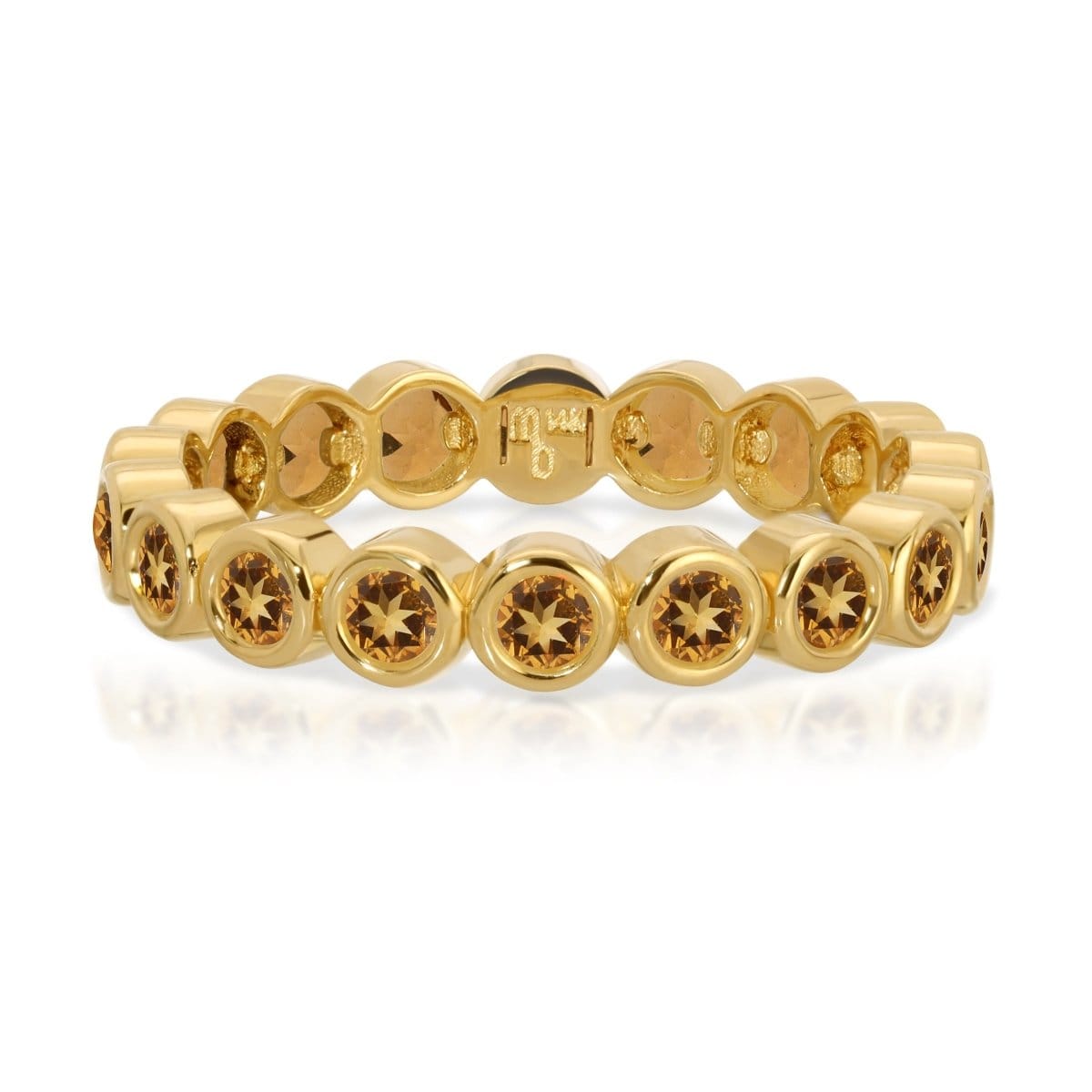 The Daisy Bouquet Ring in yellow gold on a white background.