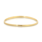 A Delicate Band in yellow gold on a white background. 