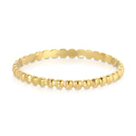 A Delicate Beaded Band in yellow gold on a white background. 