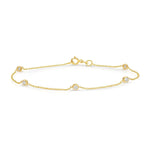 A Starstuck Diamond Bracelet in yellow gold on a white background. 
