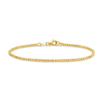 A Diamond Cut Bracelet in yellow gold on a white background. 