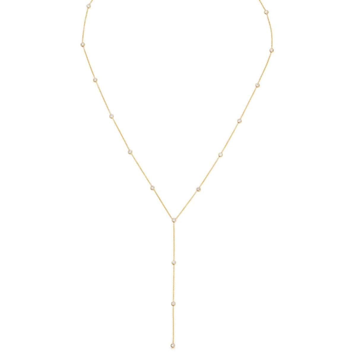 A Starstruck Diamond Lariat in yellow gold on a white background. 