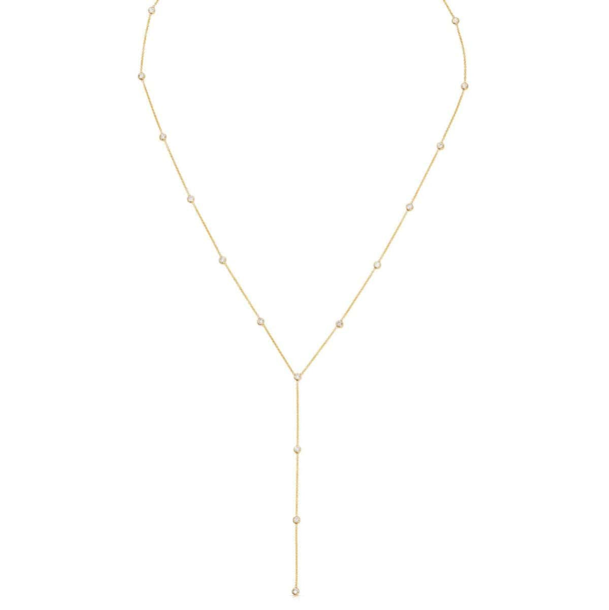 A Starstruck Diamond Lariat in yellow gold on a white background. 