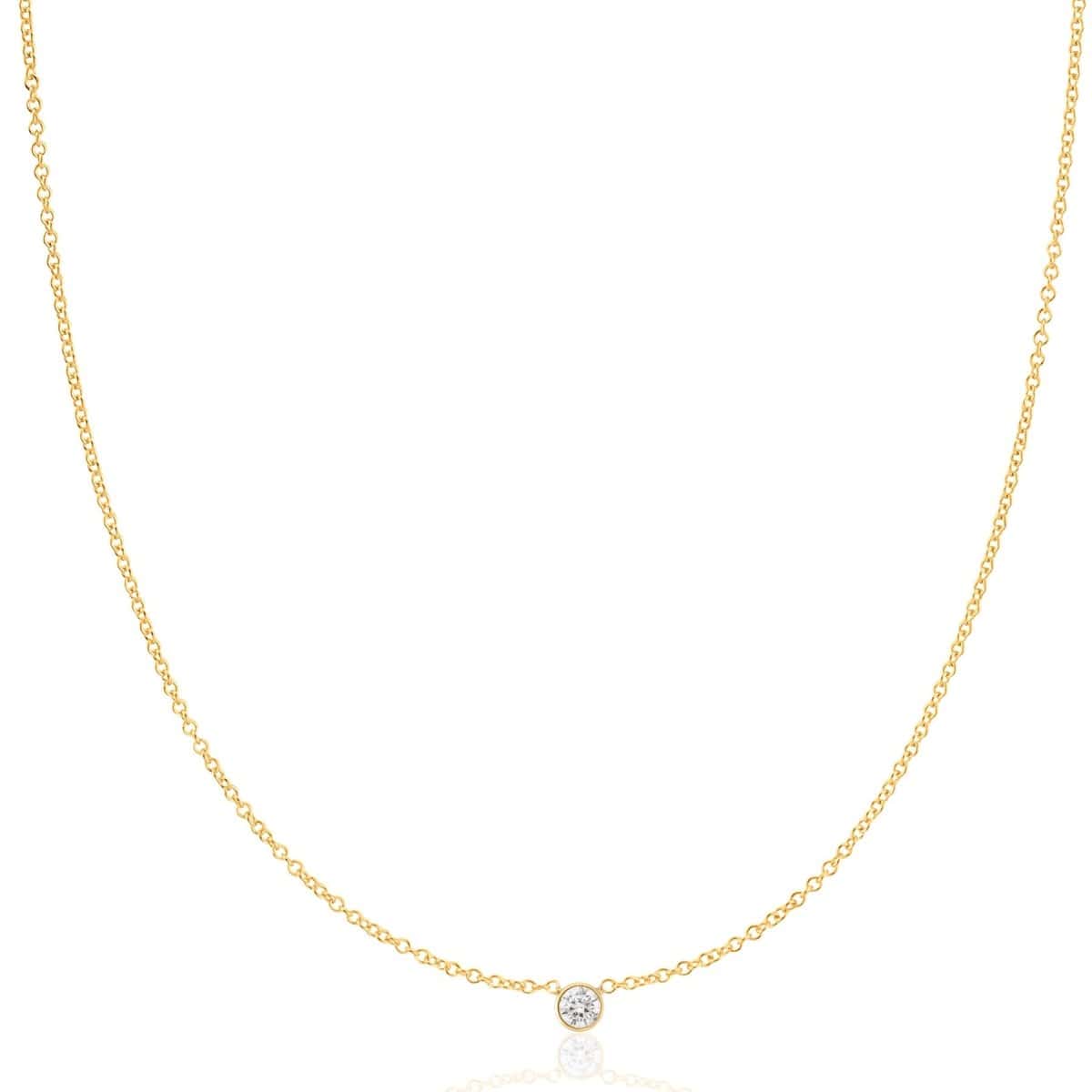 A yellow gold Diamond Layering Necklace on a white background. 