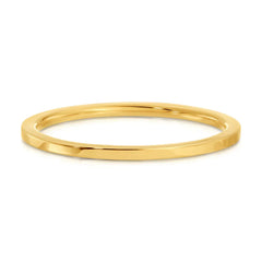 A Flat Ring in yellow gold on a white background. 