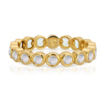 The Gardenia Bouquet Ring in yellow gold on a white background.