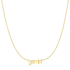 Petite Zodiac Necklace ‘gemini’ in yellow gold on a white background.