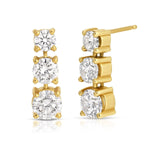 A pair of Triple Sec Diamond Earrings in yellow gold on a white background. 