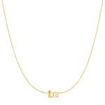 Petite Zodiac Necklace ‘libra’ in yellow gold on a white background.