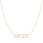 A Madre Necklace in yellow gold on a cable chain on a white background.