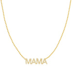 A Pavé MAMA Necklace in yellow gold on a bead chain on a white background. 
