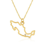 A Mexico pendant necklace in yellow gold with a diamond on a white background.
