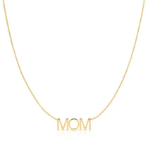 A MOM Necklace in yellow gold on a cable chain on a white background.