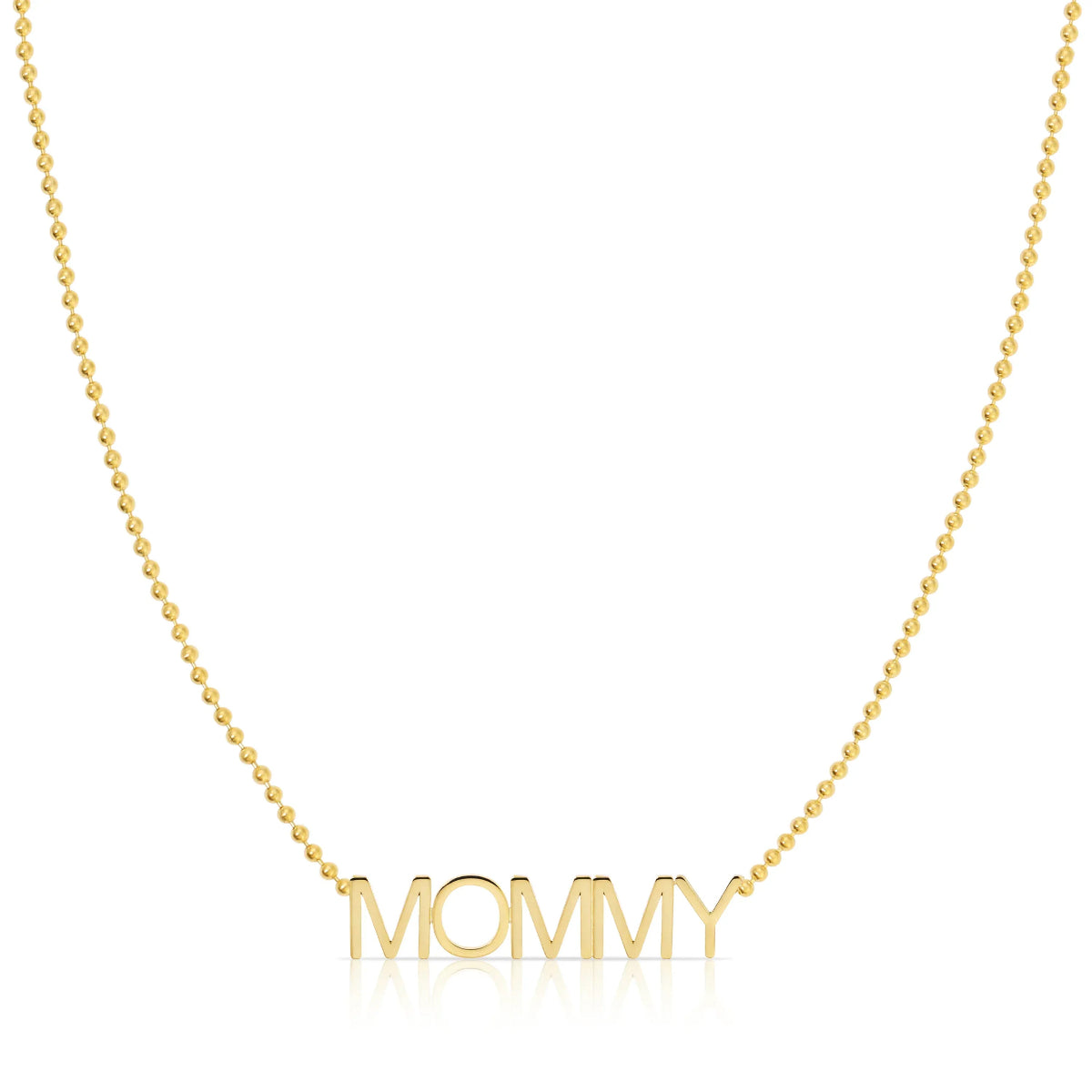 A MOMMY Necklace in yellow gold on a bead chain on a white background. 