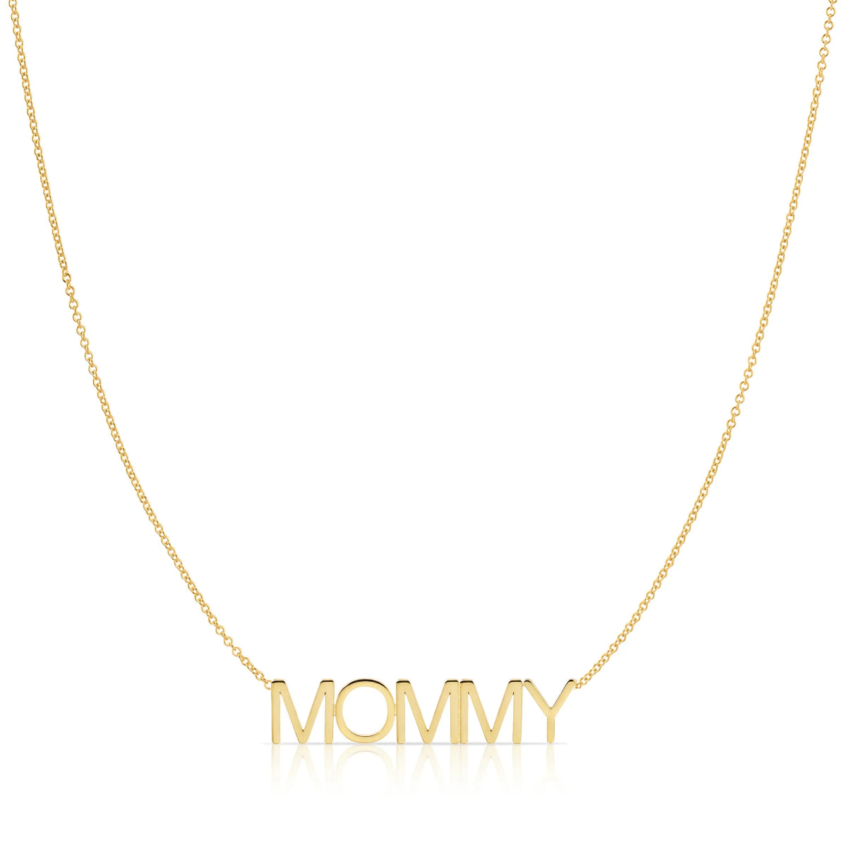 A MOMMY Necklace in yellow gold on a cable chain on a white background. 